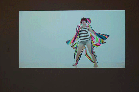 "Maggie Scheider. Projection/Painting 4. 2014, Acrylic paint and Digital video projection, dimensions variable, second edition.  Courtesy CONNERSMITH."